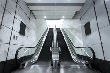 Papier Peint photo Tunnel escalator in underground tunnel