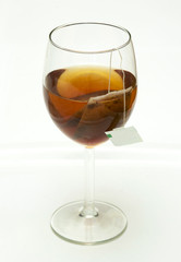 tea and teabag in wine glass