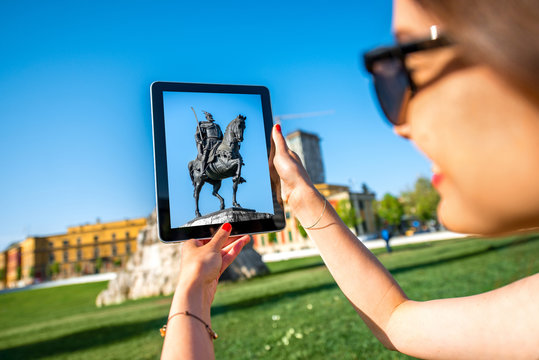 Tourist photographing Skanderbeg monument