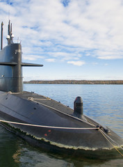 Nuclear submarine moored in the port.
