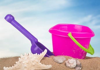 Fototapeta na wymiar Summer. Summer beach toys in the sand