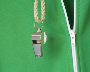 whistle of a soccer o. football referee w. sweat suit, close up,