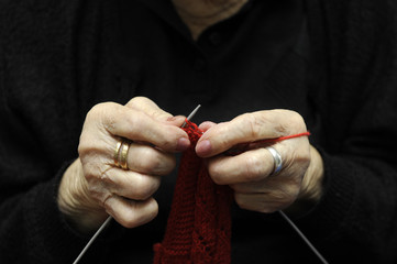 Old Woman knitting
