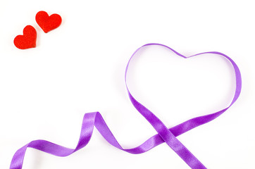 Heart shaped ribbon on white background