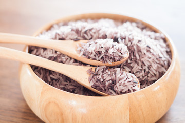 Berry rice in wooden bowl