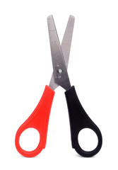 Stationery scissors with red and black handles and a ruler .