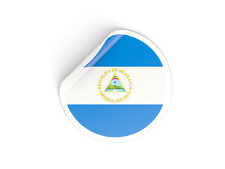 Fototapeta premium Round sticker with flag of nicaragua
