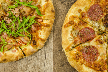 Italian pizza on wooden table
