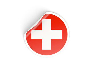 Round sticker with flag of switzerland