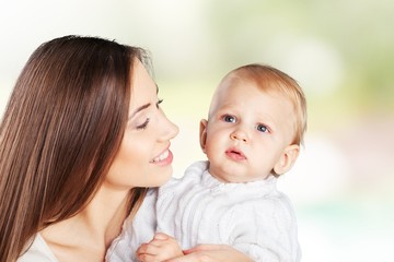 Mother. Happy cheerful family. Mother and baby kissing, laughing