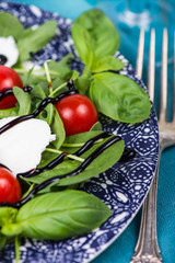 Italian salad with tomatoes,mozzarella, fresh basil and balsamic