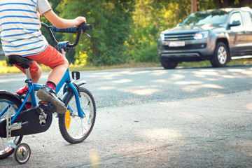 Naklejka premium child on a bicycle