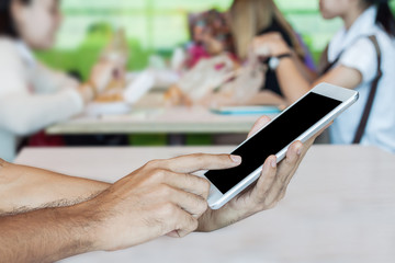 Businessman working by using digital tablet