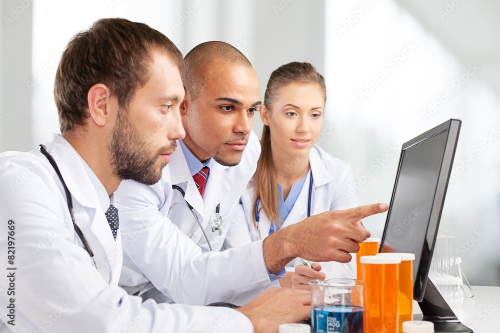 Poster laboratory. scientists working on computer in laboratory.