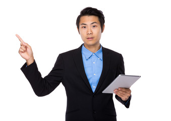 Businessman hold with tablet and finger showing up