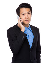 Businessman talk to mobile phone
