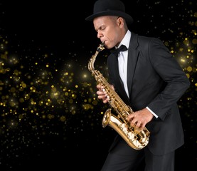 Naklejka premium Sax. Black american jazz saxophone player. Vintage. Studio shot.