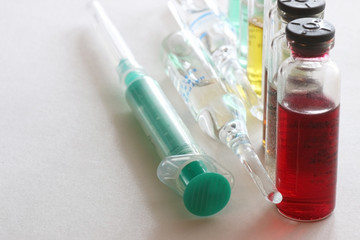 background medicine pill vials syringes