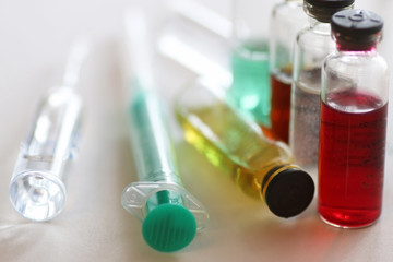 background medicine pill vials syringes