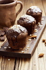 Fototapeta na wymiar Homemade chocolate muffins with nuts