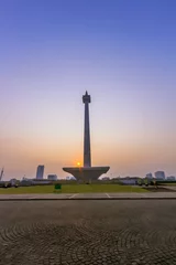 Fotobehang National Monument at Jakarta Indonesia during sunrise © Aqnus