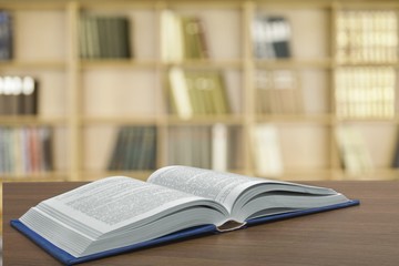 Books. Open book on the desk