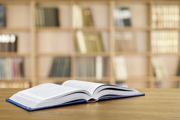 Books. Open book on the desk