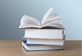 Book. A pile of books with library on the back