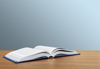 Books. Open book on the desk