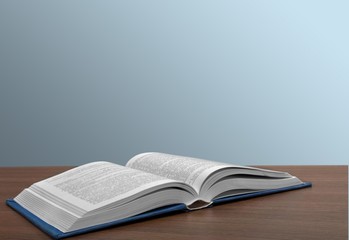 Books. Open book on the desk