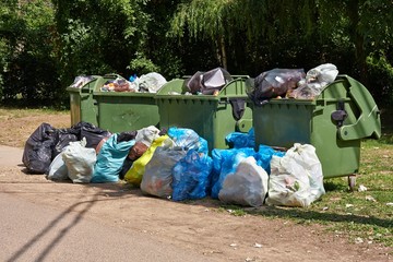 Garbage Containers Full, Overflowing