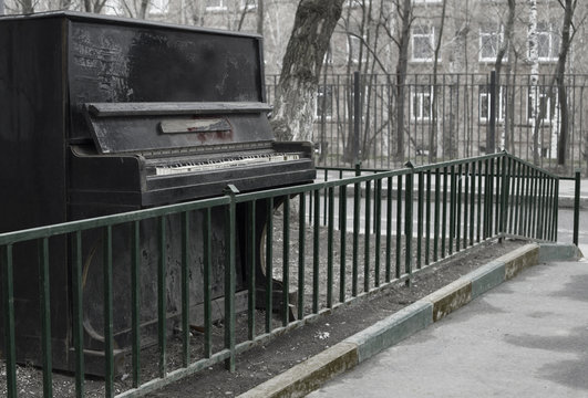 Old piano left outdoors