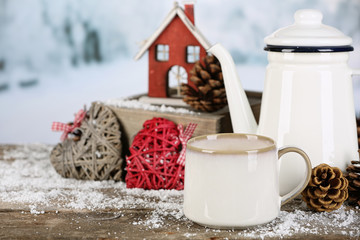 Winter composition with hot beverage on nature background