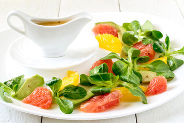Corn salad with grapefruit, avocado and orange