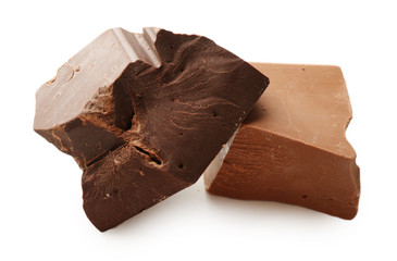 Milk and black chocolate bars isolated on white