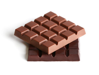 Milk and black chocolate bars isolated on white