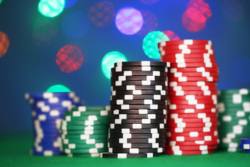 Chips for poker on shiny background