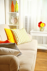 Modern interior with comfortable sofa in room