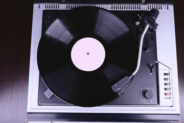 Gramophone with a vinyl record, top view