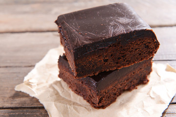 Delicious chocolate cakes on table close-up