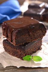 Delicious chocolate cakes on table close-up