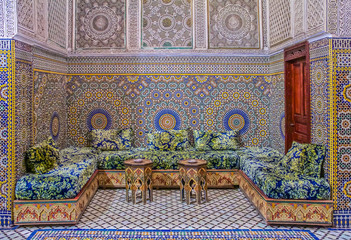 Courtyard decorated with mosaic and carvings in a Moroccan riad