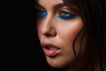 Fototapeta premium Wet woman portrait with water drops on the face