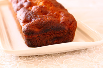 homemade apple cake over wooden table  