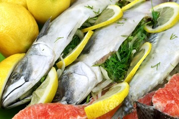 Dish With Fresh  Stuffed Fish And Salmon Steak