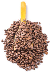 Roasted coffee beans on wooden spatula