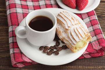 Plate with coffee and cake