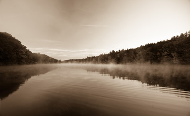 Vintage image, morning mist on the  River.