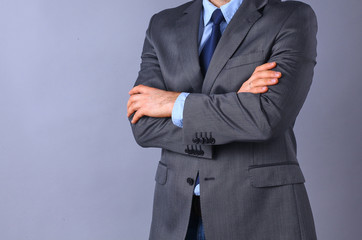 Businessman standing with arms crossed