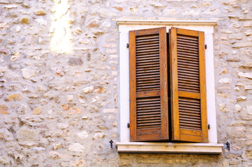Shuttered window of old italian house in Verona.